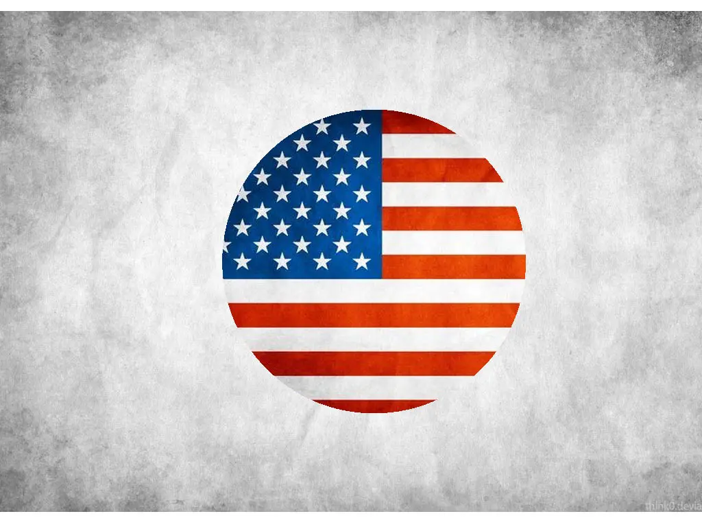 A circle featuring the American flag with its stars and stripes is centered on a textured gray background, reminiscent of discovering unique cultural experiences like those you might find in Japan.