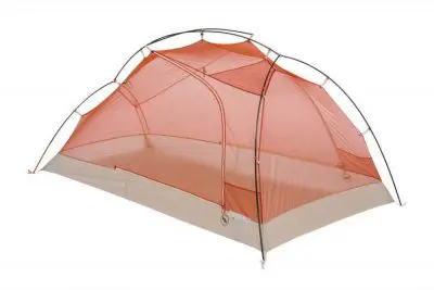 The Copper Spur 2 Platinum is a lightweight, freestanding tent featuring an orange mesh canopy and gray base, supported by slender, crossing poles. Its open and airy design makes it perfect for camping in mild weather.