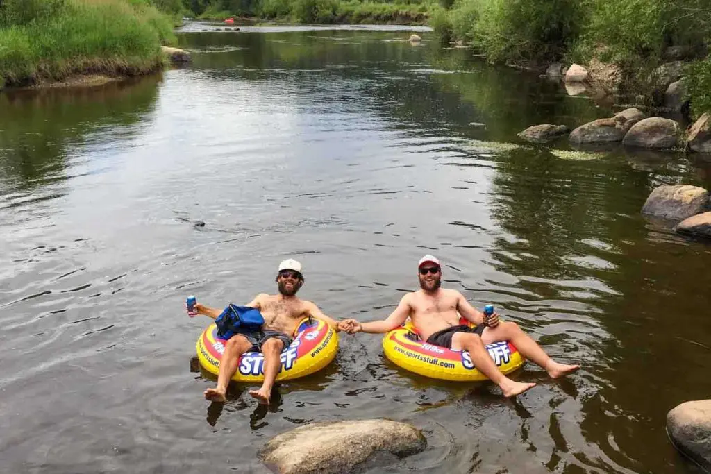 Appa and Mac floating the river in Colorado Springs, Colorado