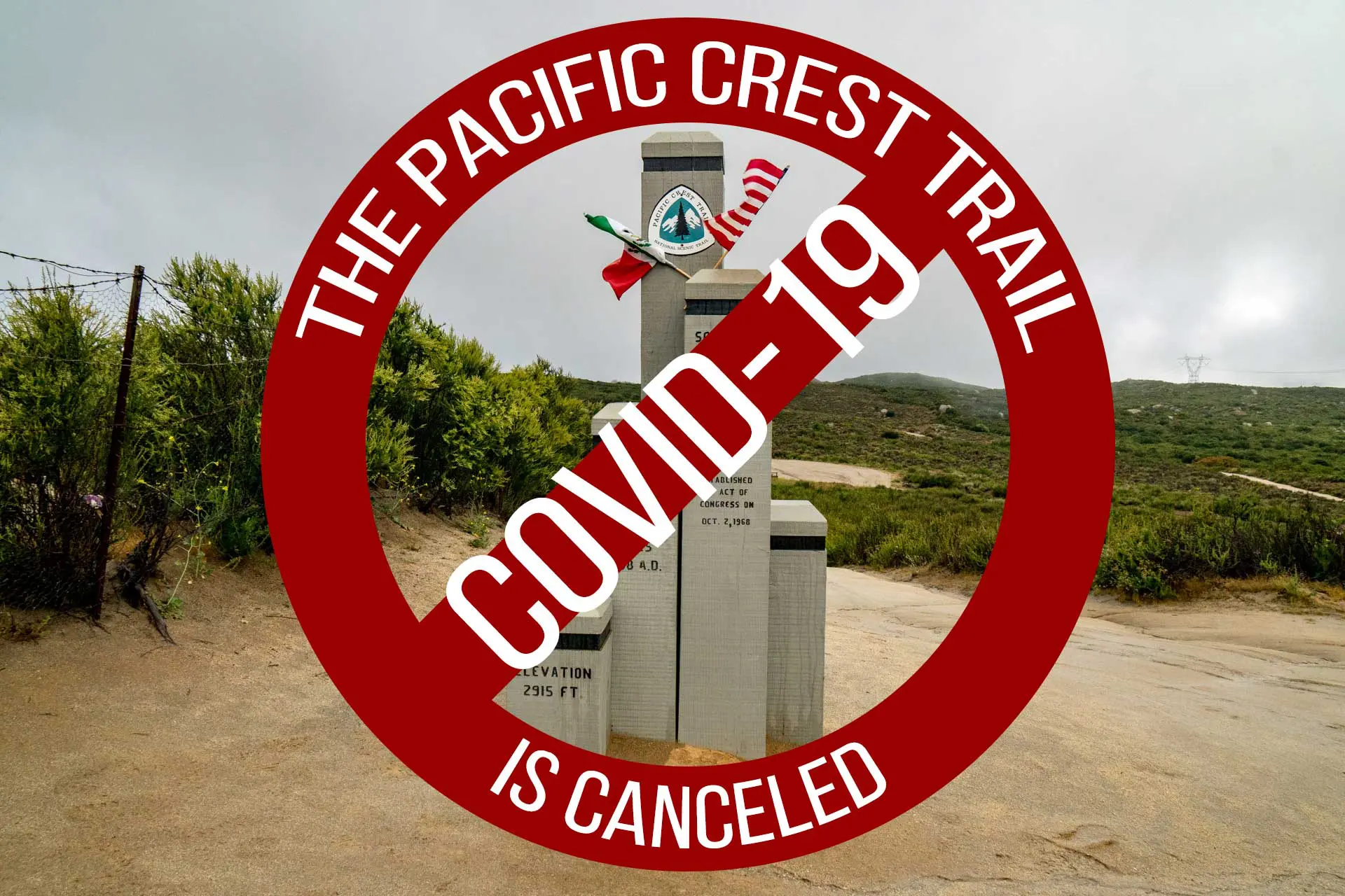 A red circle overlays a Pacific Crest Trail monument with the stark message: PCT is canceled. COVID-19. In the background, shrubs stand against a cloudy sky, highlighting the impact of the pandemic on this iconic hiking route.