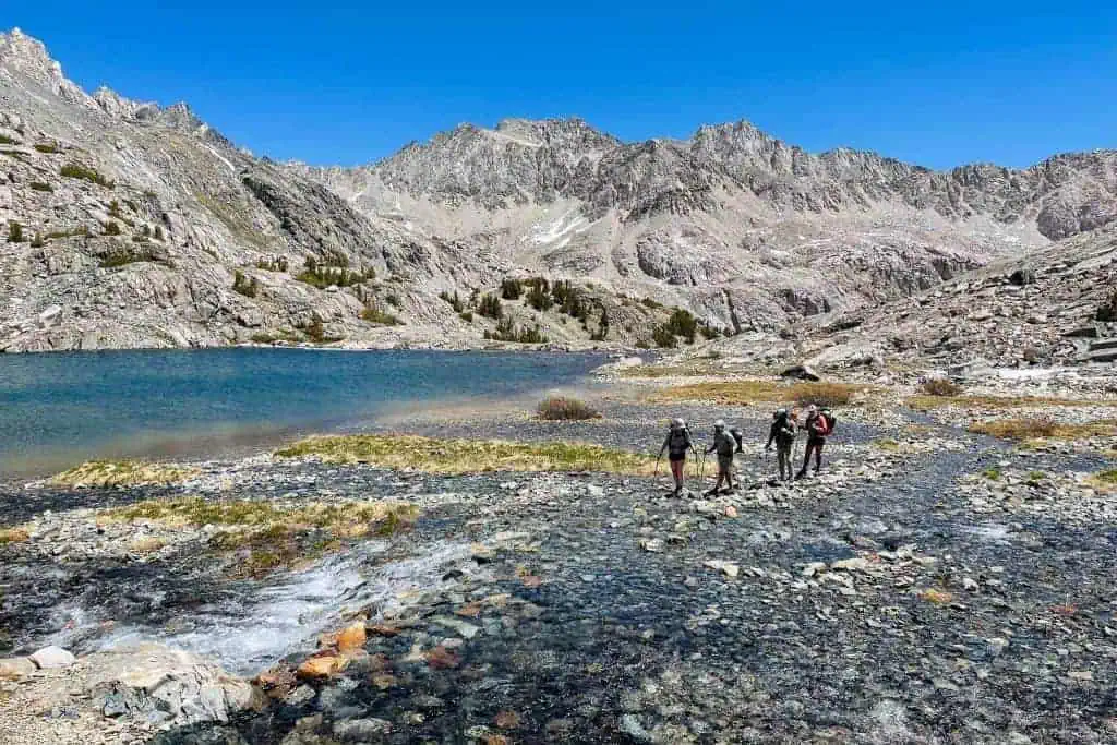 Half and Half Sierra Hikers Water Crossing