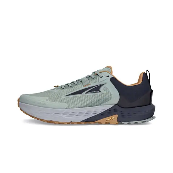 A side view of a running shoe from the jmt gear guide 2024 showcases a mint green upper, black heel, and tan accents. It boasts a thick white sole with a honeycomb pattern and Vibram outsole for traction, with the brand logo prominently displayed on the side.