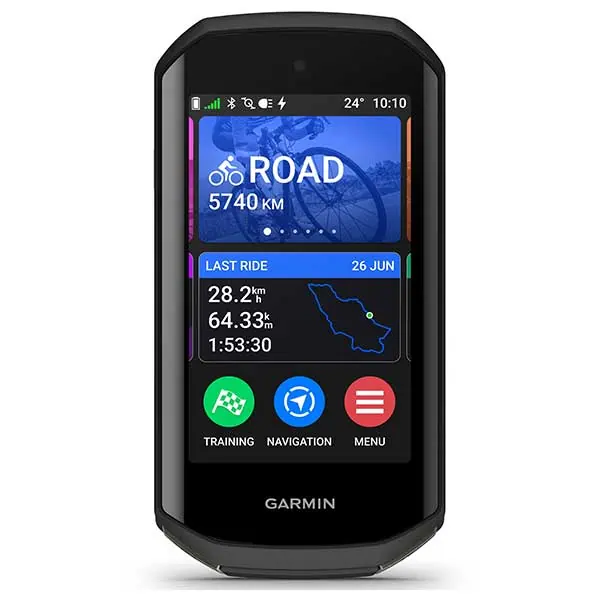 A Garmin cycling GPS device displays ride stats, including ROAD 5740 km, last ride distance (28.2 km), elevation (64.33 m), and ride time (1:53:30)—a favorite gear choice for any Tour Divide adventure, with Training, Navigation, and Menu icons below.