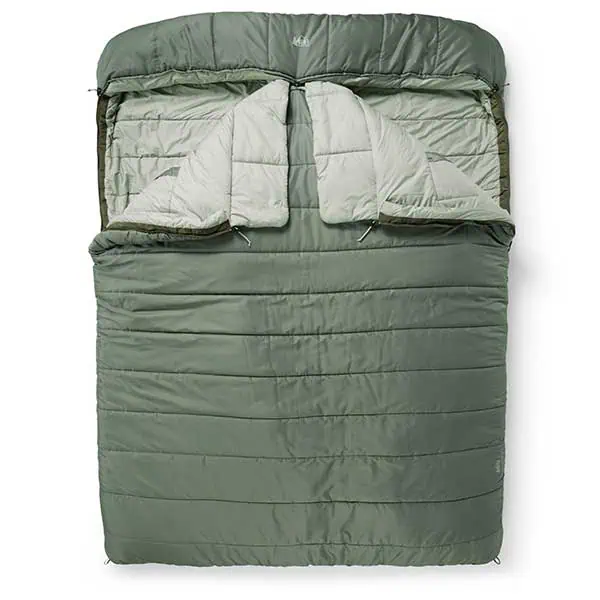 Olive green, rectangular double sleeping bag with a light gray interior, unzipped at the top to show two separate quilted layers—perfect as the best couples sleeping setup for river rafting—laid flat on a white background.
