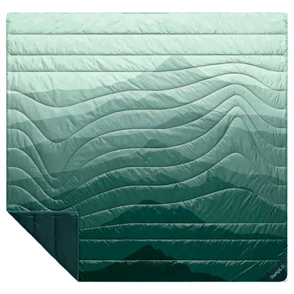 A quilt with a design resembling layered, wavy mountain ridges in various shades of green, with one corner folded over to show the dark green underside—ideal as part of the best couples sleeping setup for river rafting adventures.