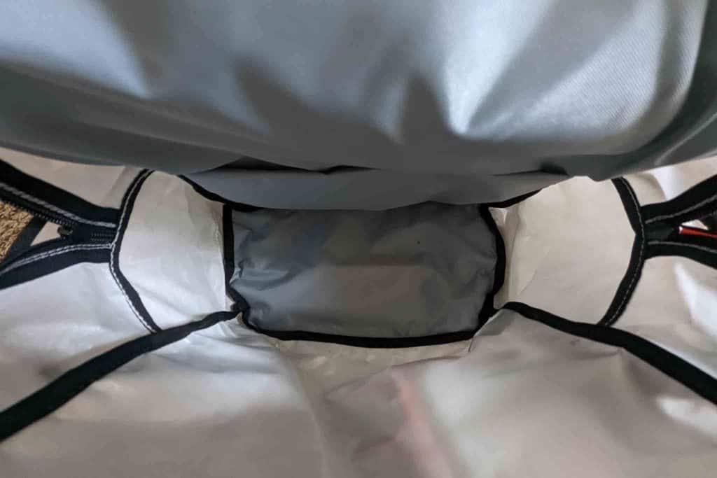 A close-up view of the inside of an empty gray and white Rogue Panda Blue Ridge Handlebar Harness, showing the inner lining, seams, and stitching details.